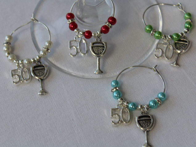 50th wine glass Charms x 4